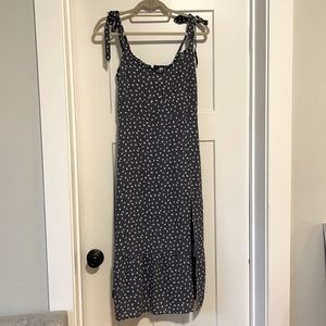 Blue polka dotted dress, side slit. Size Medium